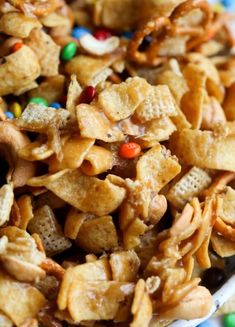 a bowl filled with cereal and candy cornflakes