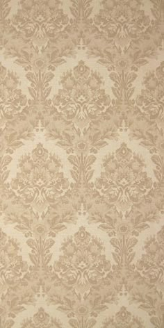 an old fashioned wallpaper pattern in beige and white