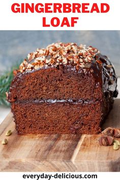 a slice of chocolate gingerbread loaf on a wooden cutting board with the title above it