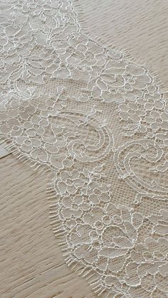 60 cm piece of Ivory lace Trim, Chantilly Lace, French Lace trim, Bridal lace, Wedding Lace, Scalloped lace, Lace Fabric, Fabric by the yard MB00249 Article: MB00249 Colors: Ivory Style: French Width: 12 cm, listed for 60cm (60 cm x 12 cm) Sold per last piece 60cm (60 cm x 12 cm) If you need a different amount, please contact us. Soft and romantic. Perfect for weeding dress,  accessories, veil. Very stunning and elegant! Limited stock. IMPORTANT: Please note, there might be a slight difference i White Lace Trim For Wedding, Ecru Lace With Lace Trim For Wedding, Elegant White Lace With Contrast Detailing, Off White Lace With Lace Trim For Wedding, Beige Wedding Lace With Lace Trim, Wedding Lace, Chantilly Lace, Lace Weddings, Scalloped Lace