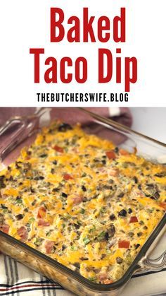 baked taco dip in a casserole dish with text overlay that reads baked taco dip the butchers wife blog