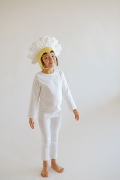 Our favorite daisy costume, but with a twist! This one comes with soft white pjs and our classic daisy hat. It comes with soft, eco-friendly cotton pajamas and a hat that snaps under the chin. Buy it on its own or with our other flower costumes for a sweet bouquet! 95% cotton, 5% spandex Made in the USA. Flower Costumes, White Pjs, Daisy Costume, Daisy Hat, Flower Costume, Sweet Bouquet, Cotton Pajamas, Halloween News, White Daisy