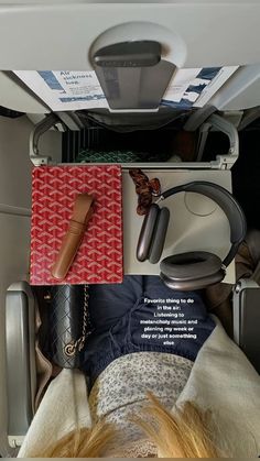 there are many items that can be seen in the back seat of an airplane or plane