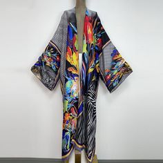 One Size fits S-3X/4X Kimono length: 58inch Material: Poly Silk (a lightweight, smooth, and shiny fabric that drapes and flows very well. An affordable alternative to silk) One Size Fits Most Size Chart Multicolor Long One-size Kimono, Summer Multicolor Silk Kimono, Long Multicolor Silk Kimono, Multicolor Long Silk Kimono, Multicolor Flowy Long Kimono, Multicolor Long Flowy Kimono, Flowy Multicolor Long Kimono, Elegant Multicolor Printed Kimono, Black Shawl Kimono For Spring