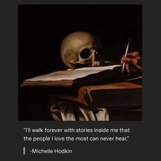 a skull sitting on top of an open book