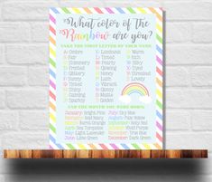 a colorful rainbow print with the words, what color of the rainbow are you?