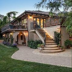 a house with stairs leading up to it