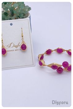 Illuminate your ensemble with the mesmerizing allure of our Eye of the Devil Pink Crystal Bracelet and Earrings. Crafted with exquisite pink crystals, each piece exudes a captivating mystique, perfect for those who dare to embrace their inner enchantress. #bangle#wirewrap#wirewrappedjewelry#wirejewelry#Diyjewelry#earrings#handmadejewelry#Diyearrings#DIYbangle#wire work Wire Jewelry With Matching Earrings For Gift, Wire Wrapped Brass Bangle Jewelry, Handmade Spiritual Wire Jewelry, Handmade Wire Jewelry For Jewelry Making, Metal Bangle Jewelry With Wire Wrapped, Bohemian Nickel-free Wire Jewelry, Wire Wrapped Dangle Jewelry, Copper Wire Bangle Jewelry Gift, Elegant Wire Jewelry With Matching Earrings