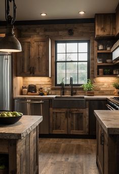 a kitchen with wooden cabinets and an island in front of a window that has lights on