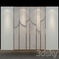 an empty room with white walls and wooden panels on the wall is lit by spotlights