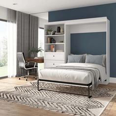 a bedroom with blue walls and white furniture