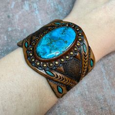 Southwestern Concho Cuff Bracelet Gift, Western Hand Tooled Cuff Bracelet As Gift, Artisan Concho Bracelets For Gift, Handmade Western Turquoise Bracelets, Artisan Concho Bracelet For Gift, Artisan Turquoise Cuff Bracelet For Festivals, Handmade Western Turquoise Bracelet, Handmade Western Style Turquoise Bracelet, Artisan Bracelet With Concho As Gift