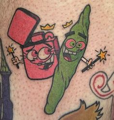 an image of two cartoon characters on the back of a man's leg with tattoos