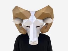 Low Poly Ram Mask - DIY Paper Craft Project. There's no need to wait! Instantly download, print, and make this cute DIY low poly paper Ram mask right in your own home with our printable mask pattern template! This paper craft project comes with detailed instructions. Subscribe and get 10% off your order. http://bit.ly/2CA6Q8U The instant download includes full instructions and the printable pattern pieces you'll need to make this full-head Ram mask! With a few basic supplies that you may already Low Poly Mask, How To Build Steps, Scissors Crafts, Printable Masks, Glue Tape, Mask Template, Cadeau Diy, Fancy Dresses Party, Diy Mask