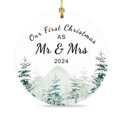 an ornament with the words our first christmas as mr and mrs