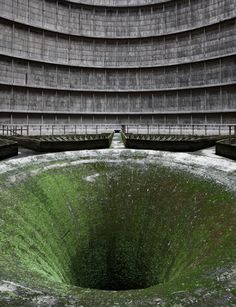 a large circular hole in the middle of a building