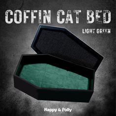 an open box with a green piece of cloth in it that says, coffin cat bed light green