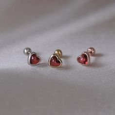 ◆ PRODUCT SPECIFICATION ◆ * Sold as Single Piece * Material : Heart Shaped Natural Garnet Cabochon, 14K Gold Vermeil (A heavy plating of 14K gold over Solid 925 sterling silver) * Jewel Head Size : 5mm(W) x 5mm(H) * Ball Screw (Back) Size : 3mm * Bar Gauge (thickness) : 20 gauge (0.80mm)  * Bar length : 6mm * Ball Screw Closure (Externally Threaded) ◆ JEWELRY CARE for GOLD PLATED 925 STERLING SILVER ◆ To keep your gold plated silver jewelry in good condition, we recommend following these additio Heart-shaped Cartilage Earrings For Gift, Heart-shaped Internally Threaded Cartilage Earrings As Gift, Heart-shaped Internally Threaded Earrings As Gift, Heart Charm Piercings As Gift, Heart Charm Piercings For Gift, Heart-shaped Piercings With Heart Charm For Gift, Heart-shaped Sterling Silver Piercings As Gift, Heart-shaped Piercings For Valentine's Day Gift, Silver Heart Piercings For Valentine's Day