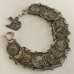 Vintage, Silver Tone, Rome, Italy Coin Bracelet W/17 Two-Sided Roman Coins & 7 Different Scenes Pictured. Approx. 7.5” Long. In Excellent Condition, From A Healthy, Smoke Free Home. Ships In 1-2 Business Days. #Jewelryart #Gifrsforher #Present #Gift #Holiday Coin Bracelet, Roman Coins, Roman Art, Coin Earrings, Present Gift, Rome Italy, Womens Jewelry Bracelets, Vintage Silver, Jewelry Art