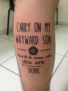 a man with a tattoo on his leg that says carry on my wayward son