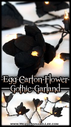 an egg carton flower with fairy lights on the top is shown in this image