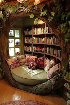 a couch made out of a tree trunk with bookshelves in the back ground