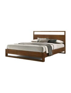 a bed that has a wooden frame and headboard on top of it, in front of a white background