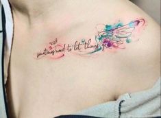 a woman with a tattoo on her chest that says, everything and to let things go