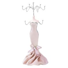 a pink dress and coat hanger with a bow on the bottom, in front of a white background