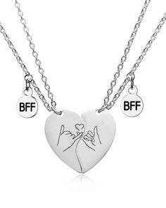 PRICES MAY VARY. ❤️ SWEET SYMBOL:This stainless steel necklace set features two half heart pendants that fit together to form a whole heart, Engraved Pinky Promise Hand Gesture on the both pendants symbolizing friendship. It makes the ideal gift to celebrate your best friend bond. ❤️ HIGH QUALITY CRAFTSMANSHIP: Crafted from durable stainless steel, the necklaces are built to withstand everyday wear without tarnishing or breaking. Featuring a polished finish and delicate chain, the necklaces offe Aesthetic Friendship Necklaces, Bff Necklaces For 2 Best Friends Friendship, Matching Chains For Best Friends, Bff Necklaces For 2 Magnetic, Heart-shaped Metal Necklaces For Friendship, Heart-shaped Metal Necklace For Friendship, Valentine's Day Stainless Steel Necklace, Silver Double Heart Necklaces For Friendship, Heart Pendant Stainless Steel Necklace For Best Friend