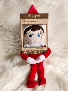 an elf with blue eyes is in a box