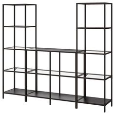 a black bookcase with three shelves on each side and one shelf below the bookshelf