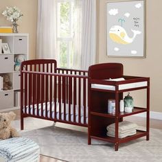 a baby's crib in a nursery room