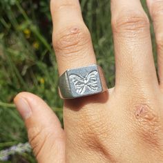 This signet ring is cast in lead-free pewter. The ring size when cast is 7.25. The sealing image is a blue morpho butterfly. could be any color morpho depending on the wax used This is part of a series of signet rings I am making cast from lead-free pewter. Each master ring is hand sculpted to give a unique, rustic style, multi-dimensional relief image when used as a stamp to seal, with sealing wax. Bug Wings, Butterfly Morpho, Kite Ring, Pewter Ring, Bday List, Blue Morpho Butterfly, Gothic Medieval, Rings Men, Morpho Butterfly