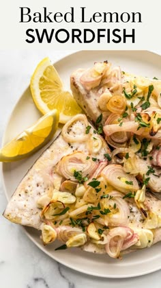 baked lemon swordfish served on a white plate