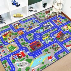 a child's play mat with cars and trucks on it