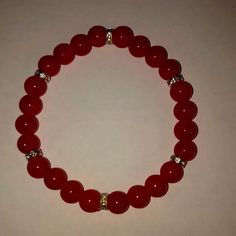 Handmade Beaded Bracelets Designed By A Young Entrepreneur Named Maya Red Bead Bracelet Ideas, Red Bracelet Ideas, Bracelet Ideas Glass Beads, Fire Bracelet, Burgundy Bracelet, Bracelet Business, Bracelet Colors, Handmade Beaded Bracelets, Braided Bracelet Diy