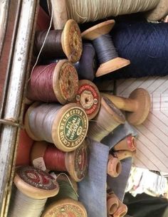 many spools of thread are on the table