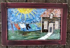 a painting on the side of a brick wall with a house and sailboats in it