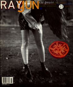 the cover of rayjunn magazine features a woman with long hair and boots on