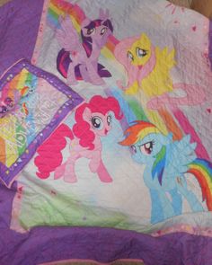 this is a bed with my little pony quilt on it and the covers have been made