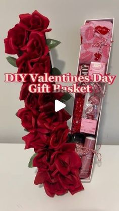 a valentine's day gift basket with roses and lipstick in the shape of a heart