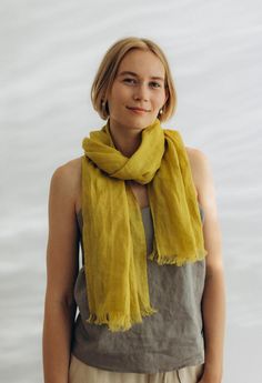 Cozy and beautiful, light and airy made from 100% linen, handmade. Scarf, handcrafted from the finest linen gauze fabrics from our collection. A comfortable and elegant accessory, suitable for everyday and special occasions. Brand: LinenFriday Certificate: STANDART 100 by OEKO-TEX Material: 100% pure linen gauze Density: 100 g/m² (4.2 oz/yd²) Size:  - 70x200 cm (27x78 inches)  - 44x180cm (17x70 inches) Washing: 40oC We produce our scarves only from excellent quality and resistant fabric. To main Casual Yellow Scarf One Size, Fringe Light, Bohemian Beige Linen Scarf, Ochre Scarf, High-end Yellow Silk Scarf For Summer, Linen Shawl, Scarf With Fringe, Linen Gauze, Linen Scarf