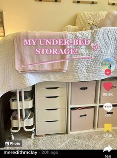 a bed with lots of drawers underneath it and a pink sign above the top that says, my under - bed storage