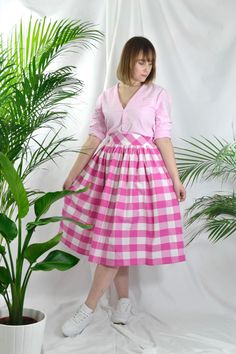 Magenta /cerise pink and white check high waist full gathered skirt. Perfect for casual outfits and special ocasions with pair of trainters or high heels. 100% cotton.  Elastic at the back of waist.  Two side pockets. Midi lenght about 70cm + 5 cm waistband. Handmade in UK.  Model wears size S.  HOW TO CHOOSE A SIZE ?   Using a measuring tape, measure the smallest part of your waist.  SIZE CHART: (CM) XS - W: 66 CM S - W: 70 CM M - W: 74 CM  L - W: 78 CM  XL - W: 82 CM  CARE INSTRUCTIONS: Hand w Waist Size Chart, Classic Casual Style, Full Gathered Skirt, Fluffy Jacket, Gingham Skirt, Cerise Pink, Style Skirt, Linen Skirt, Gathered Skirt