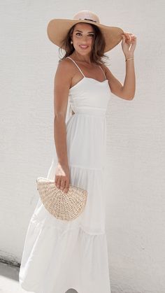 Capture bohemian charm in this ethereal white flowy maxi dress, featuring a beautifully crafted crochet top that adds intricate texture and detail to the ensemble. The flowing skirt drapes gracefully! Features: Maxi Dress White 77232 X3-1 White Flowey Dress, Beach Dress Photoshoot Photo Ideas, White Beach Dresses, Beach Dress Photoshoot, White Flowy Maxi Dress, White Dress Spring, Beach White Dress, White Dress Top, Skirt Draping