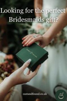 a person holding a box with the words looking for the perfect bridesmaids gift?