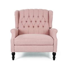 the pink chair is upholstered with buttons