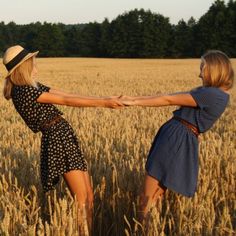 two girls in a field holding hands with the words, no one ever tried that eyesight by looking on the bright side of things