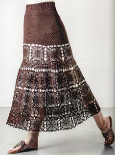 This is the crochet pattern for a long motif skirt.  This pattern is for a sizes small, medium, large, extra large, 2X, 3X, 4X and 5X.   This beautiful skirt is made up of various motifs and a lacy pattern and the result is a stunning, well fitting skirt that is perfect for many occasions. This pattern is for the advanced skill level crocheter. The two lace sections are created from a chart, please see the photos section for a small section of the chart.  Also in the photos section, you will find the size measurements and materials list.   You will need crochet hooks sizes 5 and 7 plus crochet cotton size 10.   This PDF crochet pattern will include a photo and Easy-to-Read instructions. This is an original crochet pattern; not a hand-crafted piece of apparel. No physical item will be shipp Granny Square Skirt Schematic, Crochet Maxi Skirt Chart, Long Skirts Crochet, Crochet Granny Square Long Skirt, Skirt Crochet Pattern, Maxi Skirt Pattern, Designer Crochet, Skirt Crochet, Crochet Skirts